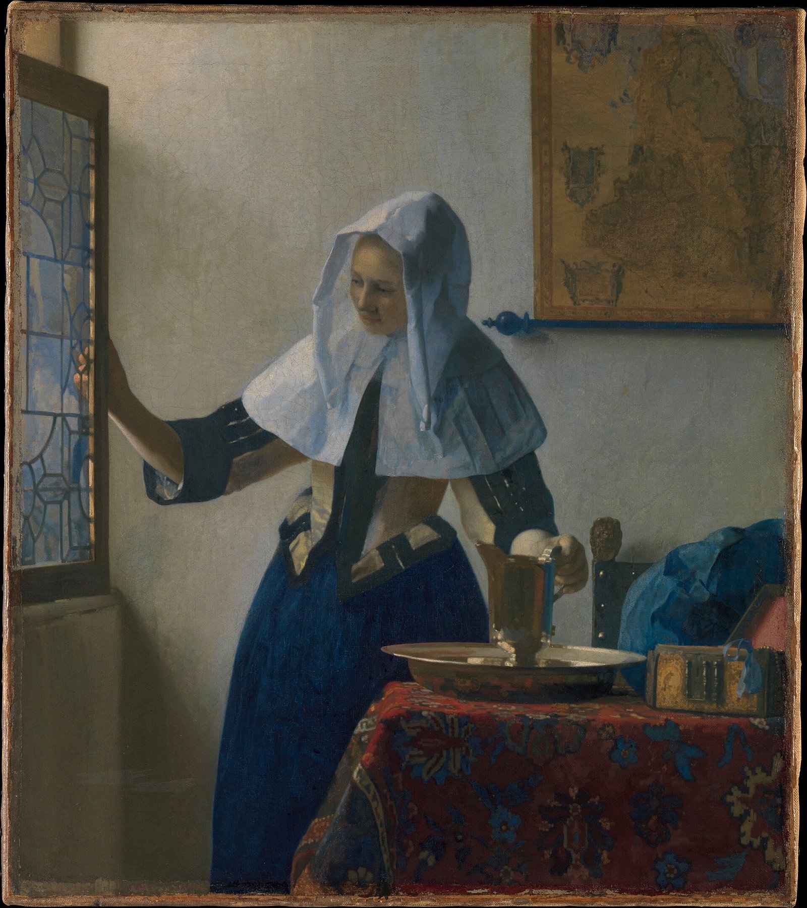 Hand-painted oil reproduction of Young Woman with a Water Pitcher, the 1662 Johannes Vermeer morning light in a quiet Dutch interior