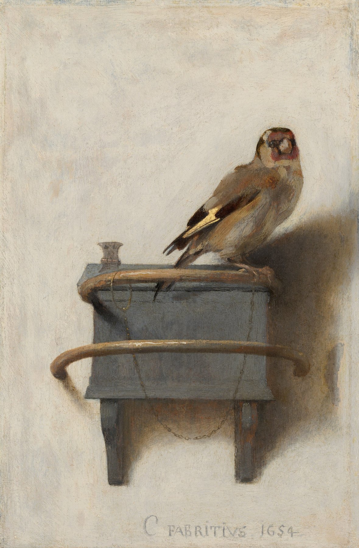 Hand-painted oil reproduction of The Goldfinch, Carel Fabritius intimate Dutch Golden Age panel of a chained goldfinch on its feed box